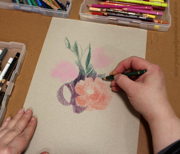 Starting a colored pencil drawing. Coloring flowers freely. Answering to three questions about your art.