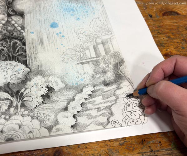 Drawing an imaginary scenery with pencils and ink pens.