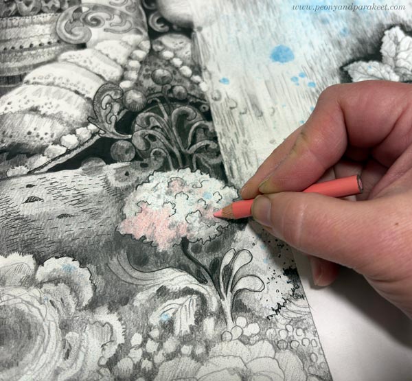 Using a colored pencil as an accent for a black and white drawing.