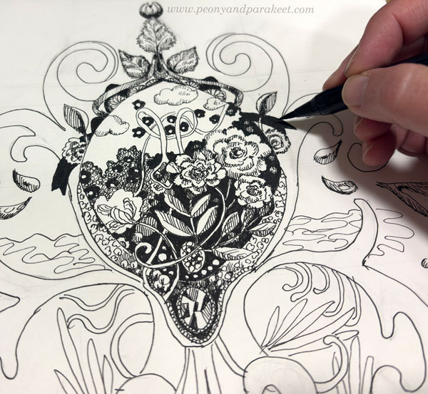 Drawing a summer ornament and working on the details.