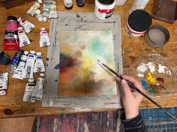 Starting an intuitive acrylic painting.